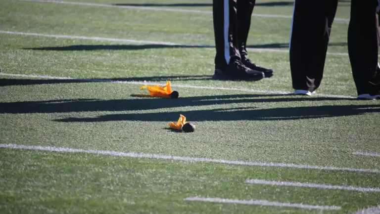two penalty flags on the football field